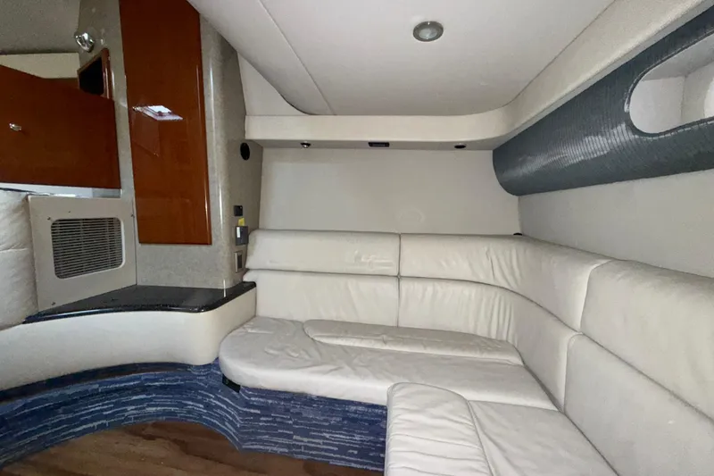 Slide: The Image of Interior of 2006 Formula 40 Performance Cruiser with white leather seating and wood accents. - 20