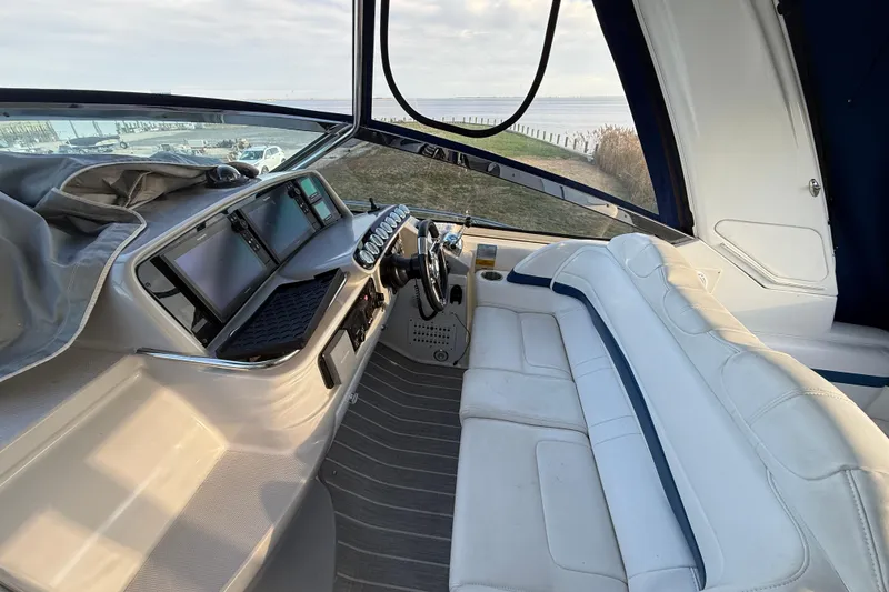 Slide: The Image of 2006 Formula 40 Performance Cruiser cockpit with modern navigation equipment and comfortable seating. - 28