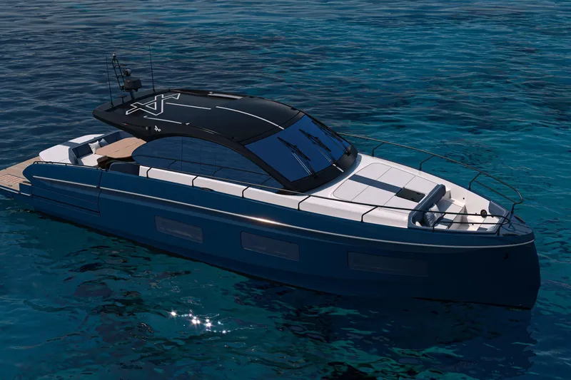 Slide: The Image of 2026 Beneteau Gran Turismo 50 yacht on clear blue water. - 13