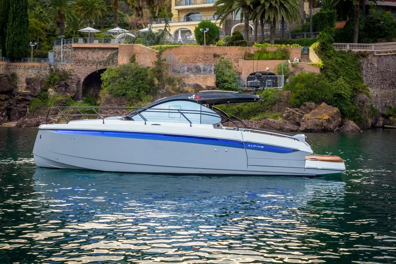 Slide: The Image of 2026 Beneteau Gran Turismo 40 yacht on serene water, lush greenery in background. - 18