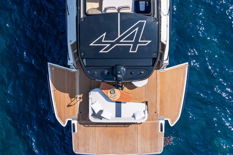 Slide: The Image of Top view of 2026 Beneteau Gran Turismo 40 yacht with wooden deck and seating area. - 20