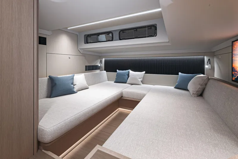 Slide: The Image of Luxurious interior of 2026 Beneteau Gran Turismo 40 yacht with modern seating and cushions. - 26