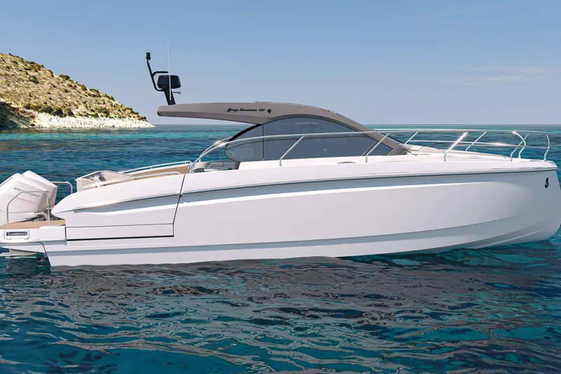 Slide: The Image of 2026 Beneteau Gran Turismo 40 yacht on clear blue water near rocky coastline. - 39