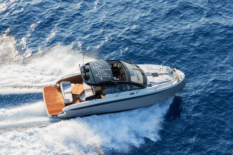 Slide: The Image of 2026 Beneteau Gran Turismo 40 cruising on open blue sea. - 9