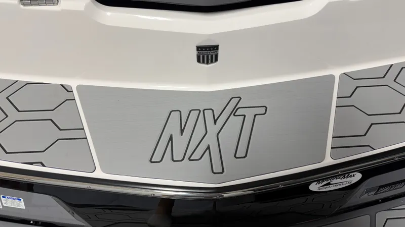 Slide: The Image of MasterCraft NXT24 2026 boat hull with stylish design. - 11