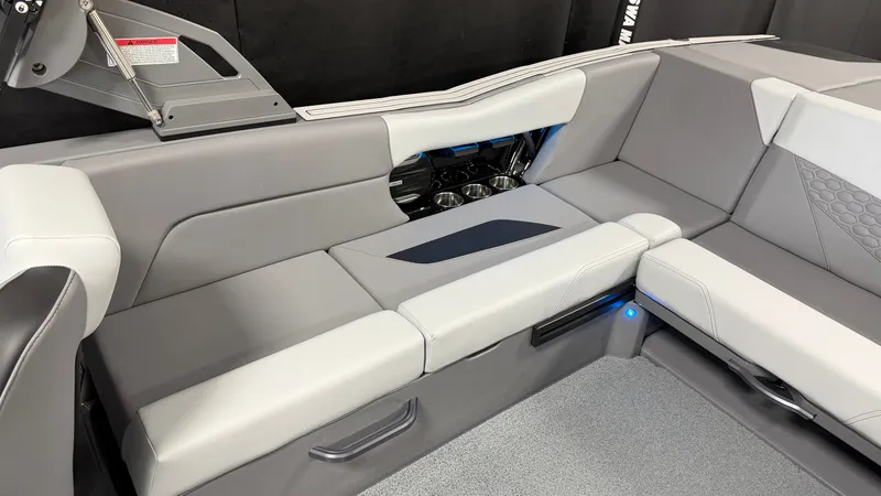Slide: The Image of Interior of 2026 MasterCraft NXT24 with gray upholstery. - 26