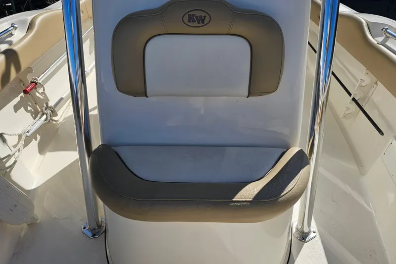 Slide: The Image of 2017 Key West 239 FS boat seat with beige and white upholstery. - 13