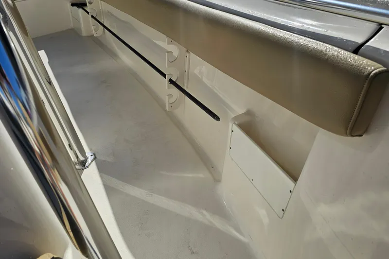 Slide: The Image of Interior view of 2017 Key West 239 FS boat, featuring seating and storage area. - 14