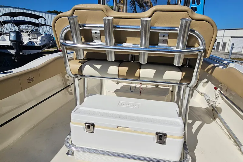 Slide: The Image of 2017 Key West 239 FS boat interior with rod holders and cooler. - 21
