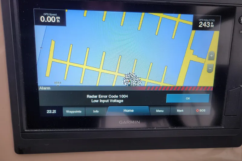 Slide: The Image of Interior of 2006 Carver 36 Mariner with colorful cushions and modern helm. - 18