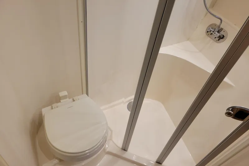 Slide: The Image of Standard Horizon GX2400GPS radio on 2006 Carver 36 Mariner dashboard. - 29