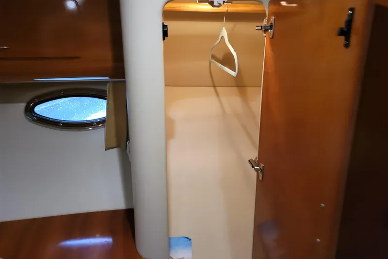 Slide: The Image of Luxurious interior of 2006 Carver 36 Mariner yacht with elegant dining area. - 35