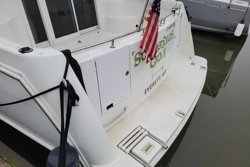 Slide: The Image of 2006 Carver 36 Mariner docked at marina, Everett, WA, overcast sky. - 5