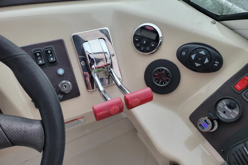 Slide: The Image of Colorful striped cushions on a 2006 Carver 36 Mariner boat seat. - 20