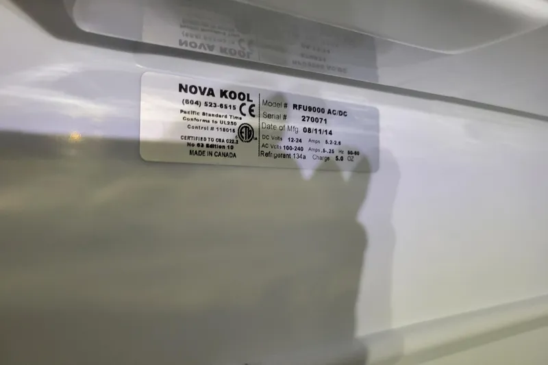 Slide: The Image of Instrument panel of a 2006 Carver 36 Mariner boat, showing RPM and gauges. - 26