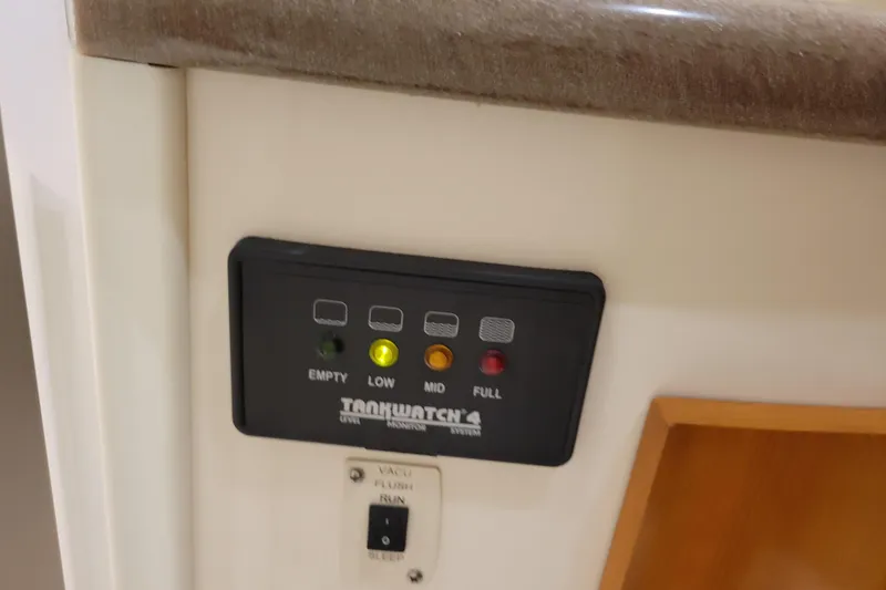 Slide: The Image of Control panel of 2006 Carver 36 Mariner yacht with certification and warning labels. - 31