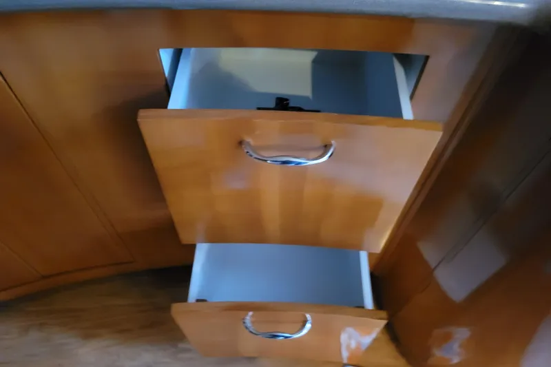 Slide: The Image of DVD player in 2006 Carver 36 Mariner boat interior, featuring control buttons. - 42