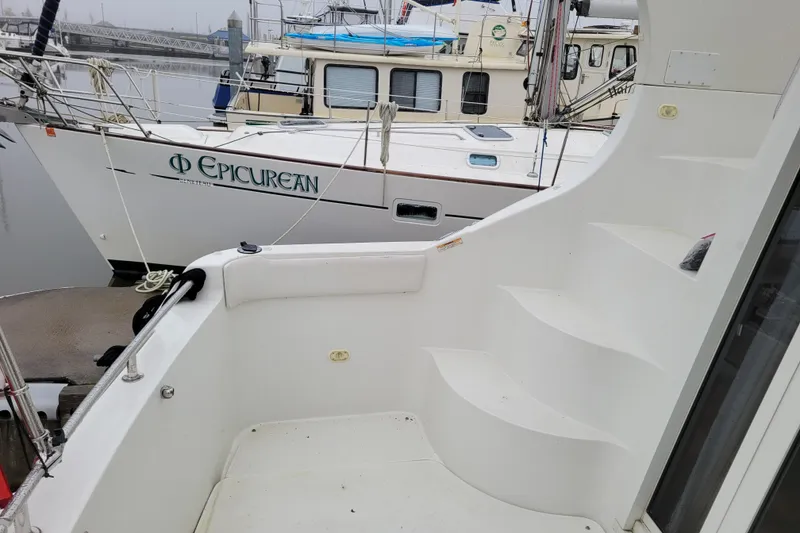 Slide: The Image of 2006 Carver 36 Mariner docked, rear view with "St Brendan's Gra II" name, Everett, WA. - 6