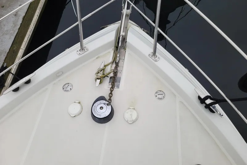 Slide: The Image of Bow of 2006 Carver 36 Mariner with anchor chain and deck fittings. - 71