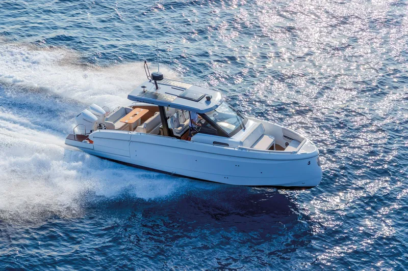 Slide: The Image of 2025 Beneteau Gran Turismo 35 cruising on open water, showcasing sleek design and performance. - 3