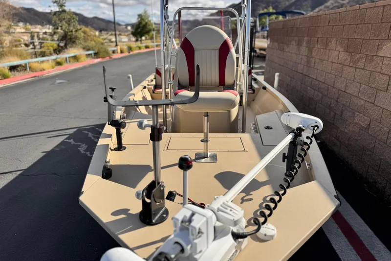 Slide: The Image of 2021 G3 Bay 20 DLX boat with fishing equipment on a sunny day. - 10