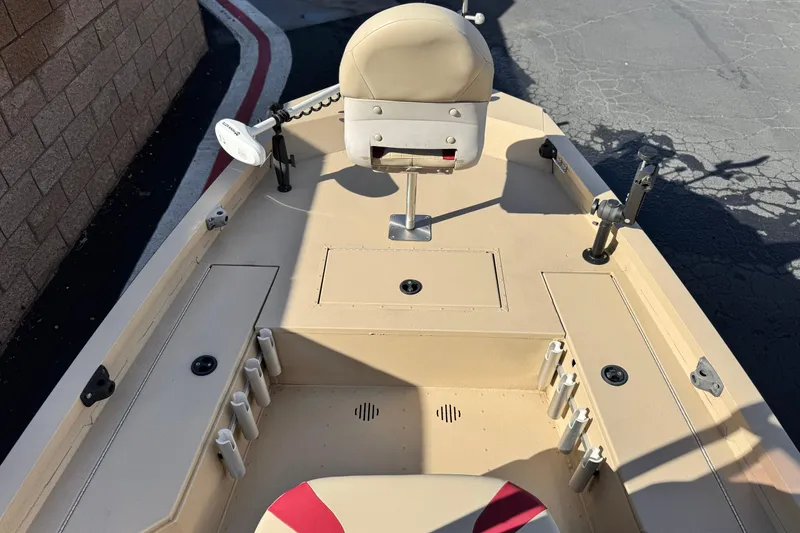 Slide: The Image of 2021 G3 Bay 20 DLX boat interior with seating and storage compartments. - 12