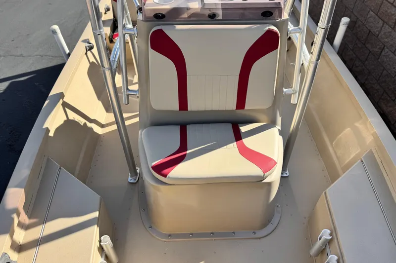 Slide: The Image of 2021 G3 Bay 20 DLX boat interior with red and white seating. - 14