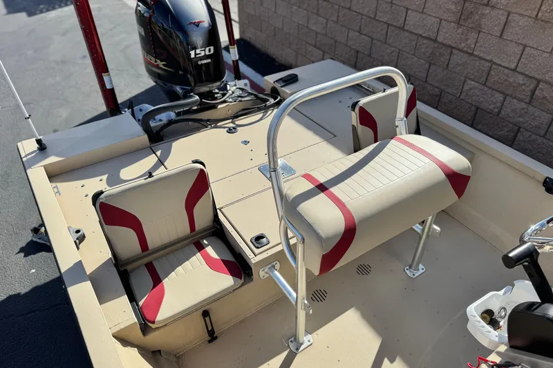 Slide: The Image of 2021 G3 Bay 20 DLX boat interior with Yamaha 150 engine, featuring red and beige seating. - 19