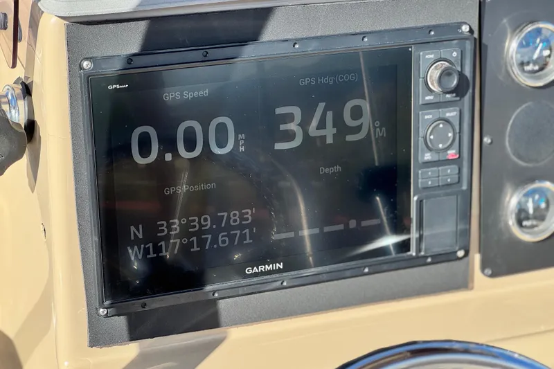 Slide: The Image of Garmin GPS display on 2021 G3 Bay 20 DLX boat showing coordinates and speed. - 24