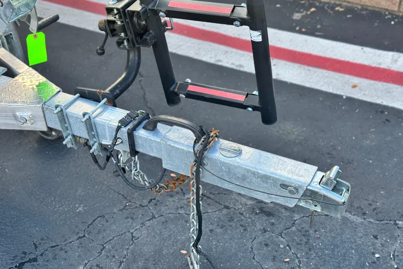 Slide: The Image of Trailer hitch of 2021 G3 Bay 20 DLX boat on asphalt surface. - 26