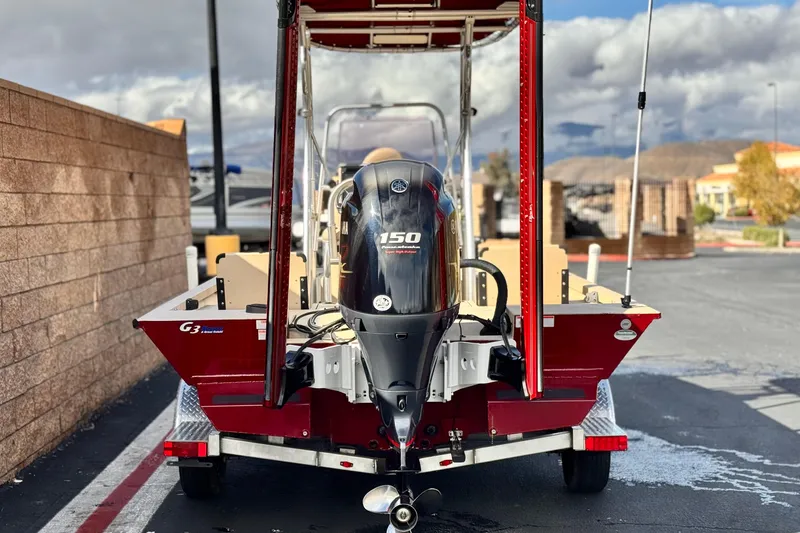 Slide: The Image of 2021 G3 Bay 20 DLX boat with 150 horsepower engine on trailer. - 4