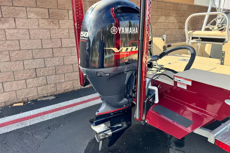 Slide: The Image of 2021 G3 Bay 20 DLX boat with Yamaha VMAX outboard motor, parked on pavement. - 6