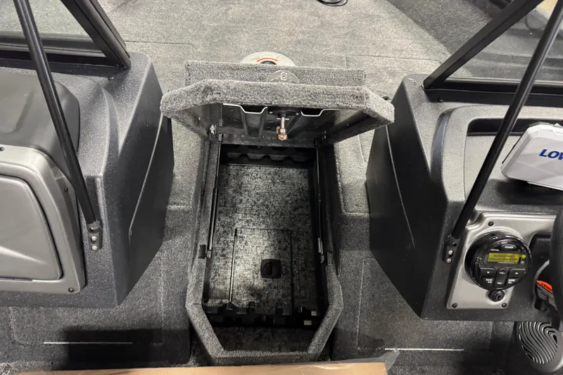 Slide: The Image of 2026 Tracker Pro Guide V-175 WT boat interior with open storage compartment. - 17
