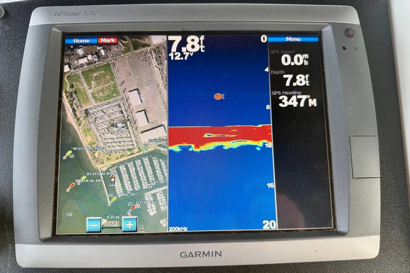 Slide: The Image of Garmin GPS display on 1997 Carver 355 Aft Cabin Motor Yacht showing navigation and depth data. - 16