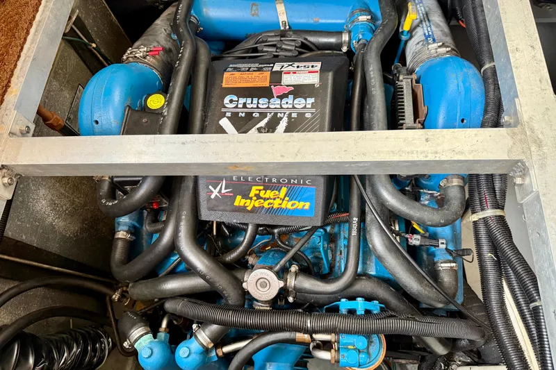 Slide: The Image of Engine compartment of a 1997 Carver 355 Aft Cabin Motor Yacht with Crusader engine. - 30