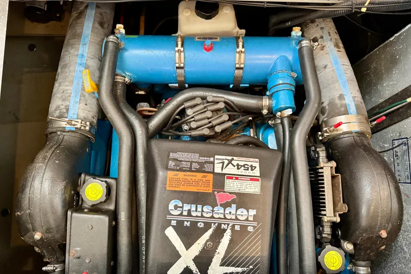 Slide: The Image of Engine compartment of a 1997 Carver 355 Aft Cabin Motor Yacht with Crusader engine. - 31