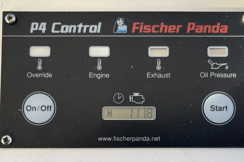 Slide: The Image of Fischer Panda P4 Control panel with override, engine, exhaust, and oil pressure indicators. - 35