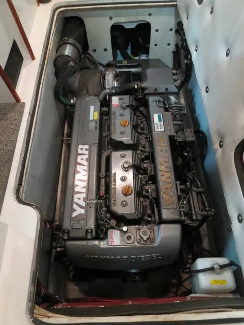 Slide: The Image of Yanmar engine in a 2001 Northern Bay 36 boat, showcasing detailed mechanical components. - 38