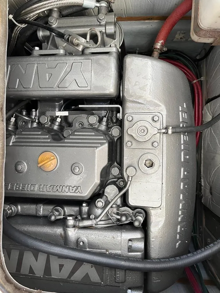 Slide: The Image of Engine compartment of a 2001 Northern Bay 36 boat, featuring a Yanmar diesel engine. - 39