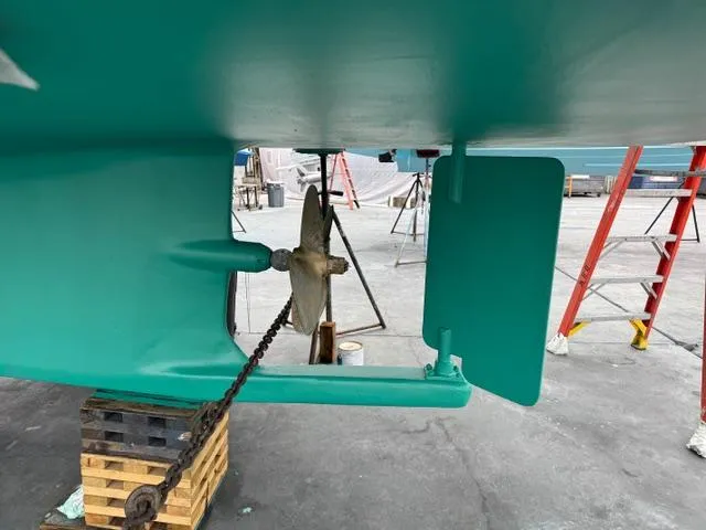 Slide: The Image of Propeller and rudder of 2001 Northern Bay 36 boat on dry dock. - 41