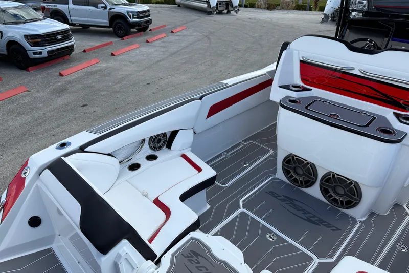 Slide: The Image of 2025 Sunsation 32 CCX boat interior with sleek seating and modern design features. - 11