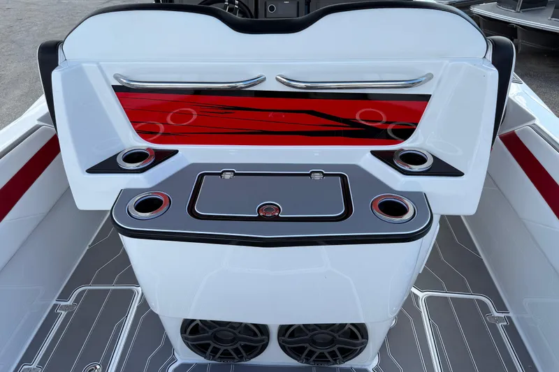 Slide: The Image of 2025 Sunsation 32 CCX boat interior with sleek design, cup holders, and modern accents. - 13
