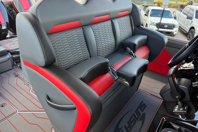 Slide: The Image of 2026 Sunsation 34 CCX boat interior with stylish red and gray seating. - 21