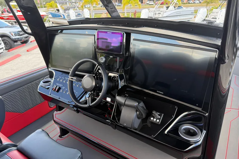 Slide: The Image of 2026 Sunsation 34 CCX boat dashboard with advanced navigation and control systems. - 22