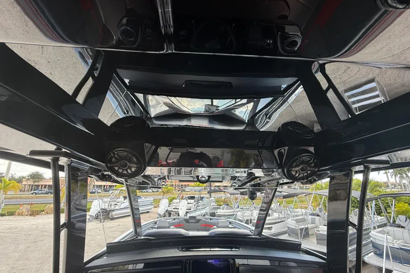 Slide: The Image of 2026 Sunsation 34 CCX boat interior with sleek design and advanced audio system. - 30