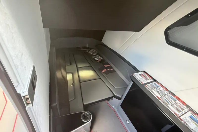 Slide: The Image of 2026 Sunsation 34 CCX cabin interior with sleek seating and modern design elements. - 33