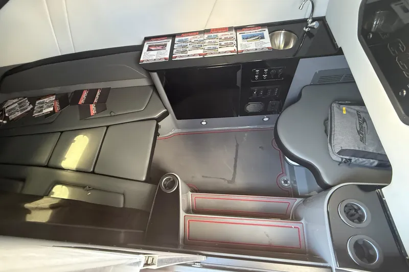 Slide: The Image of Interior of 2026 Sunsation 34 CCX boat with seating, sink, and control panel. - 35