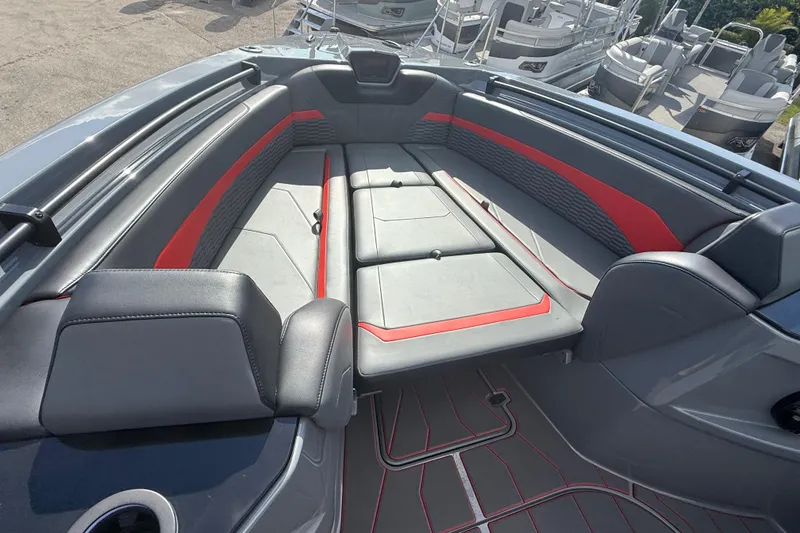 Slide: The Image of 2026 Sunsation 34 CCX boat interior with gray and red seating, modern design. - 38