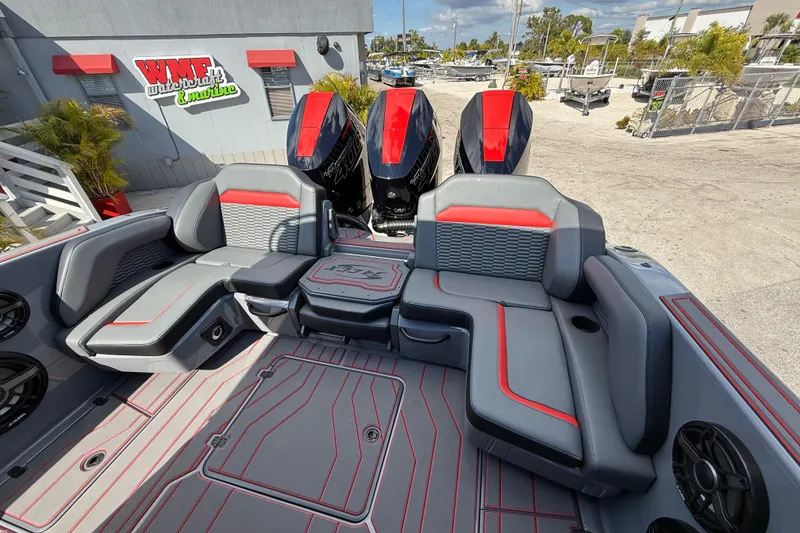 Slide: The Image of 2026 Sunsation 34 CCX boat interior with sleek seating and powerful engines. - 42