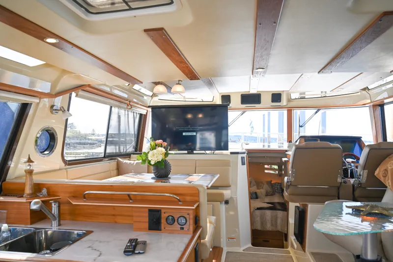 Slide: The Image of Luxurious interior of 2022 Ranger Tugs R-43 CB yacht with modern amenities and elegant design. - 27